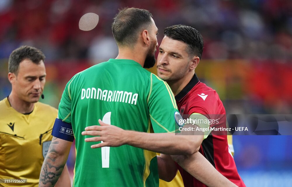 aly-interacts-with-berat-djimsiti-of-albania-prior.jpg