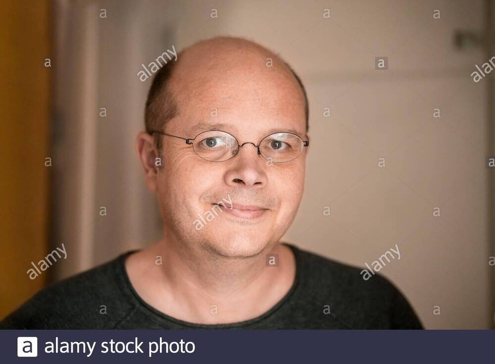 shot-portrait-of-a-smiling-50-year-old-man-2B6N539.jpg