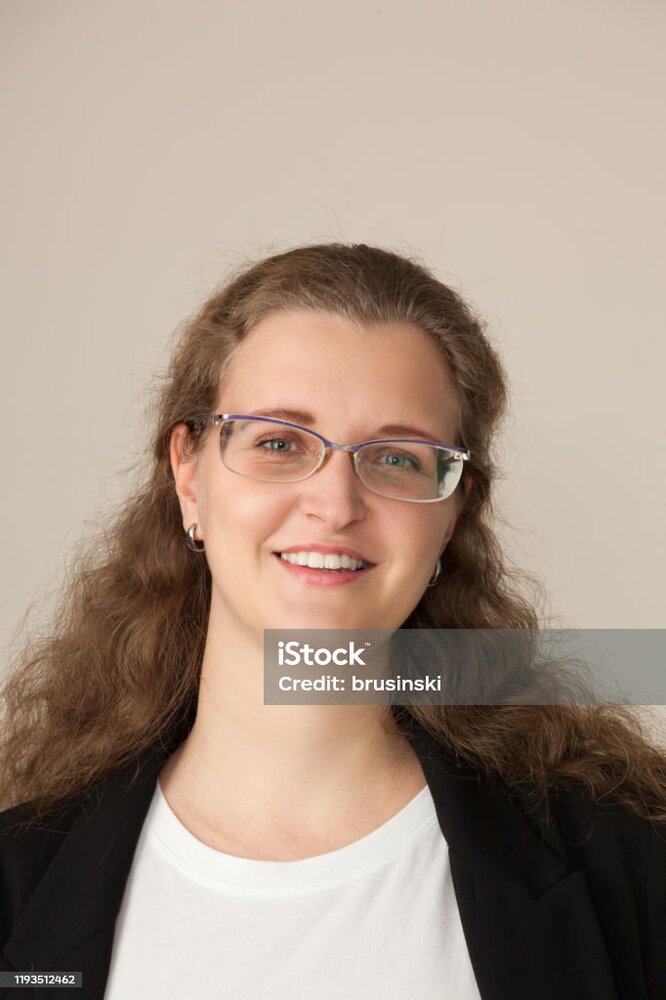 studio-portrait-of-a-30-year-old-woman.jpg