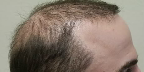 10MonthDrWongRightTemple.jpg